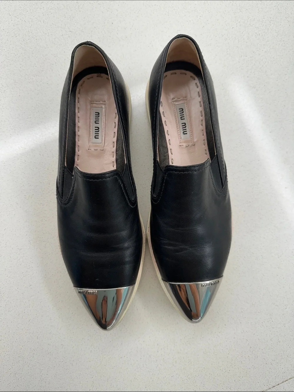 Miu Miu Black Leather Slip-On Flats with Silver Cap Toe